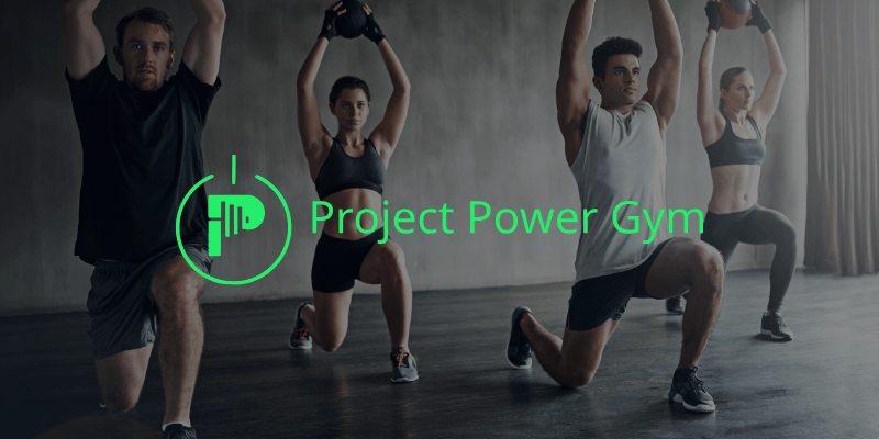 a group fitness class raising med balls above their heads while lunging
